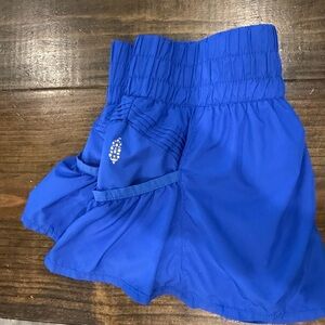 Free People Movement Get Your Flirt OnRoyal Blue Athletic Shortswith Ruffled Hem